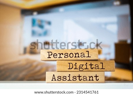 Wooden blocks with words 'Personal Digital Assistant' Royalty-Free Stock Photo #2314541761
