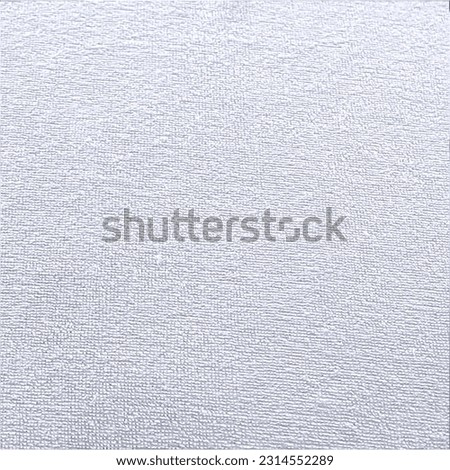 white waterproof terry towel sheet closeup view Royalty-Free Stock Photo #2314552289