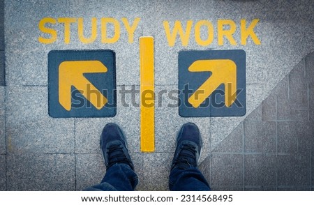 A man standing between “study and work” word.He is wearing black Shout and standing on Metal floor. go,grow. Photo choose  and  sign concept idea.