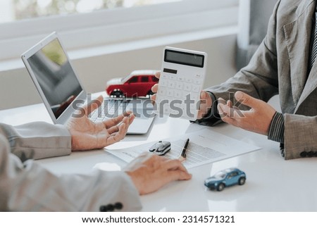 Car rental company service business, dealer hand giving, holding car keys to tenant customer, new owner after signing lease contract, purchase agreement in document, car sale contract.
