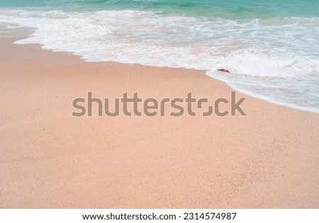 Tropical summer beach sand and beautiful sky with coconut palm tree background.