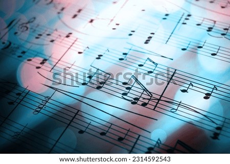 Sheet with music notes as background, closeup. Color tone effect