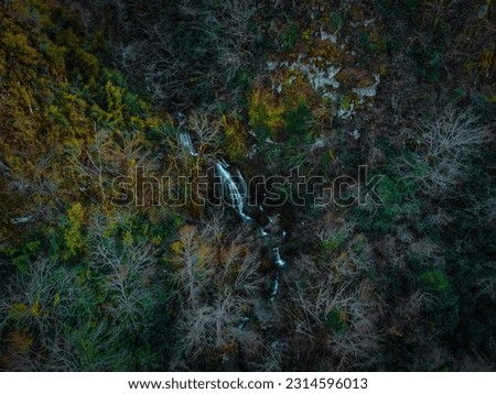 aerial waterfall view in autumn