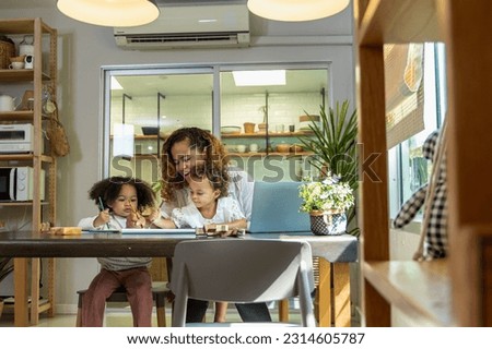 heartwarming captures the joyous moments of an African mother who skillfully balances role, Her engages in creative painting child session while fulfilling work responsibilities. work life balance