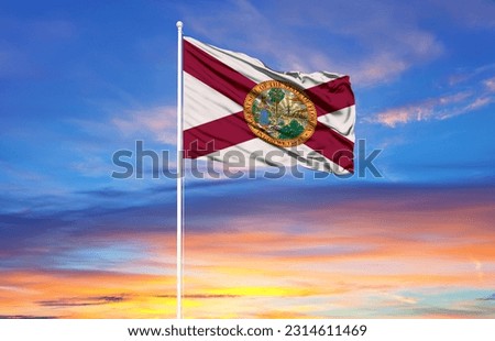 flag of Florida on flagpoles and blue sky. Patriotic concept about state.  
