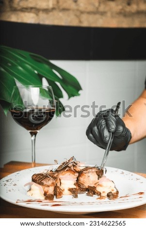 Exquisite Gourmet Delight: A Culinary Masterpiece Indulge in the tantalizing flavors and visual splendor of this exquisite gourmet dish. Every element is carefully curated to deliver an unforgettable. Royalty-Free Stock Photo #2314622565