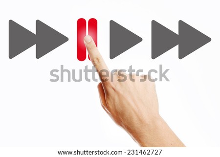 Pause, Male hand pressing pause button on the virtual screen Royalty-Free Stock Photo #231462727