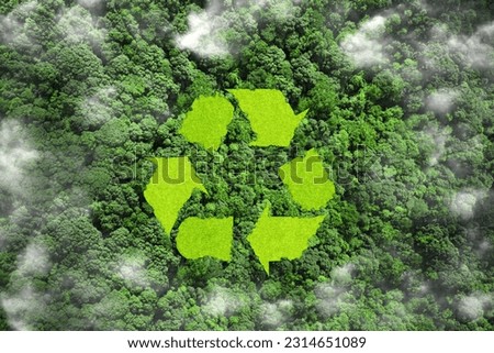 recycling waste concept. recycling sig green grass in the forest. Idea for reuse for recycling environmental protection world. ecological waste management and a sustainable and economical lifestyle.