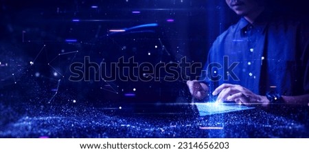 Digital information technology concept. Man use cybersecurity computers to protect against online threats. Data Analytics or Data Science. Binary code, polygons and particles on dark blue background. Royalty-Free Stock Photo #2314656203