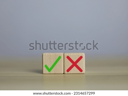 wooden block yes or no symbol and checkmark  Alternative concepts, decision making, and true and false test questions. Royalty-Free Stock Photo #2314657299
