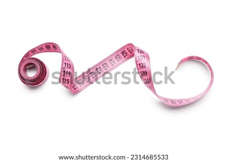 Pink tape measure on white background Royalty-Free Stock Photo #2314685533