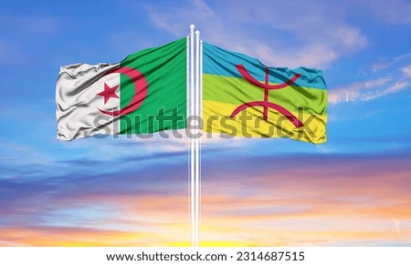 Algeria and Berber two flags on flagpoles and blue sky 
 Royalty-Free Stock Photo #2314687515