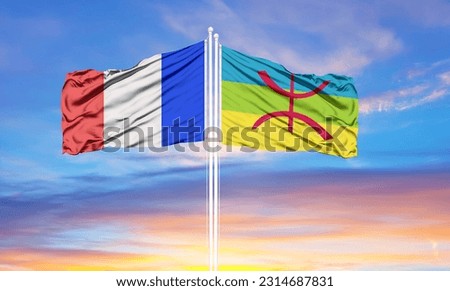france and Berber two flags on flagpoles and blue sky 
 Royalty-Free Stock Photo #2314687831
