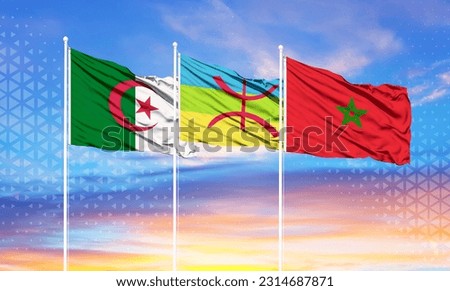 flags of morocco, algeria and Berber on flagpoles and blue sky
 Royalty-Free Stock Photo #2314687871