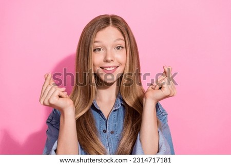 Photo portrait of pretty young teenager girl showing double heart korean gesture wear trendy jeans outfit isolated on pink color background