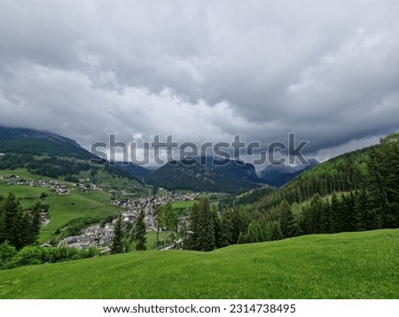 Storm clouds over the Dolomites in Val Gardena, South Tyrol.