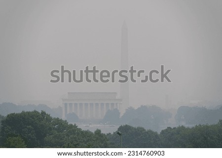 The smoke from the Canadian Wildfires obstructing the view of the DC Skyline from Arlington Virginia. Royalty-Free Stock Photo #2314760903