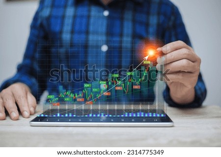 Display stock market charts. Business hand working with stock market investment use tablet. Investment growth The growing power of the compound interest concept. success wealth stock investment.