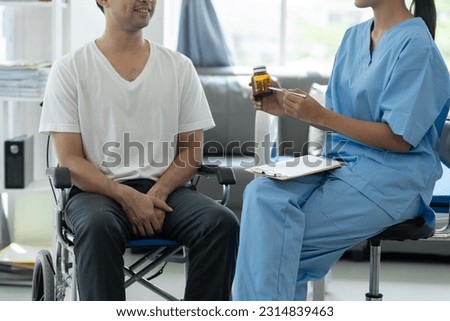 Psychologists or physiotherapists give advice and how to take medicine for a male patient in a wheelchair who has pain in the genital area. Testicles to heal the pain health insurance concept.

 Royalty-Free Stock Photo #2314839463