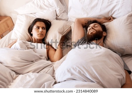 Bedroom, snore and couple sleep, frustrated and woman angry over snoring, problem and morning noise. Sleeping, home insomnia and relax girl with fatigue, tired and sleepless in apartment bed Royalty-Free Stock Photo #2314840089