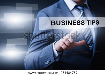 business, technology, internet and networking concept - businessman pressing business tips button on virtual screens