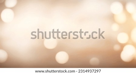 Elegant beige bokeh abstract background. Delicate blurred wallpaper texture. Template with defocused bokeh lights and copy space for business website design. Banner social media advertising. Royalty-Free Stock Photo #2314937297