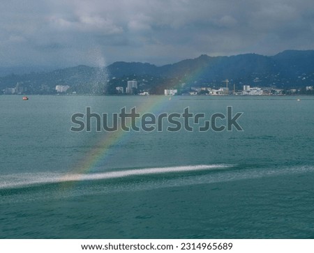 Batumi, Georgia - June 8, 2023: rainbow on the sea
