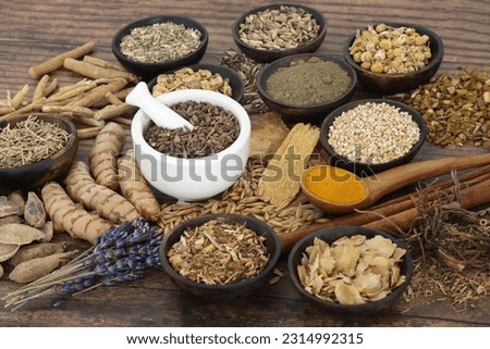 Nervine natural food collection. Herbal medicine for relaxing and nourishing the nervous system. Healthy natural adaptogen stress relieving alternative health care plant based medicine.   Royalty-Free Stock Photo #2314992315