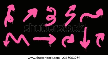 Set graffiti clip art. Urban street style. Collection of pink arrows. Isolated on black background. Splash effects and drops. Grunge and spray texture. 