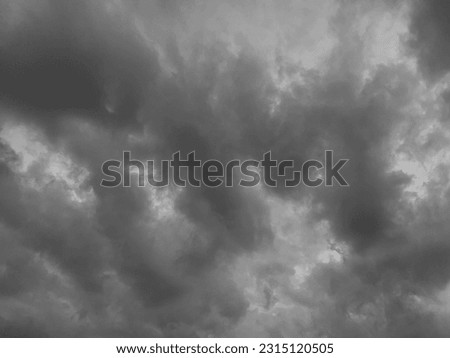 Turbulent skies, strong winds, low pressure with stratocumulus clouds layered gray Ascend to the sky and it will rain heavily in Bangkok, Thailand.no focus