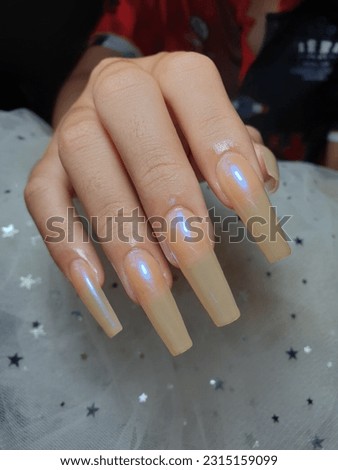 plastic nail extensions  Light brown with a glimpse of blue