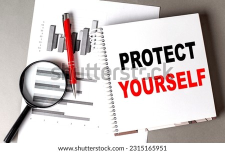 PROTECT YOURSELF text written on a notebook with chart