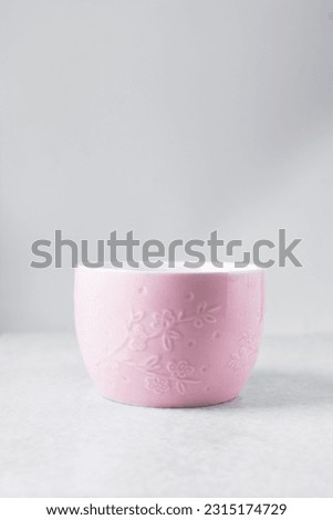 Large pink mug on a marble tray, pink coffee cup