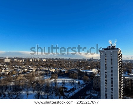 View of Davisville neighborhood covered in snow during snowy winter. Toronto, Ontario, Canada. 2022-11-20