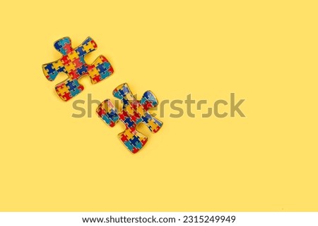 Autistic pride day - 18 june. World autism awareness day or month background. Colorful puzzle symbols of autism awareness. Copy space Royalty-Free Stock Photo #2315249949