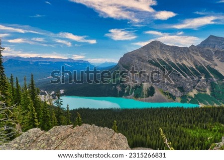Panoramic view of the world famous Fairmont Hotel on the banks of the gorgeous Lake Louise Royalty-Free Stock Photo #2315266831