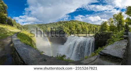 Scenic autumn view of waterfall in Letchworth State Park - a 14,427-acre (5,838 ha) New York State Park located in Livingston County and Wyoming County in the western part of the State of New York,USA