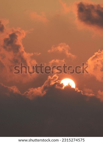 Beautiful sunrise at sea with clouds