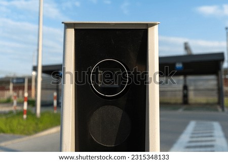 Automatic number plate recognition, digital surveillance camera. Smart parking lot entrance pass automation. Vehicle access control. Car park entry identification system. License plate reader. Royalty-Free Stock Photo #2315348133