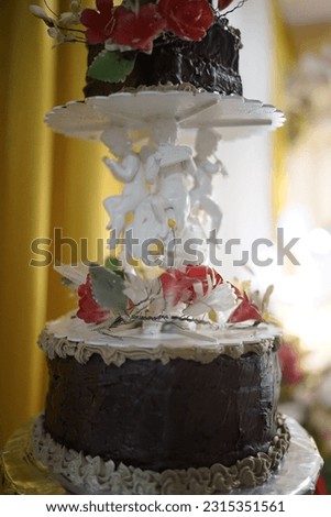 love fairy statue decoration on wedding cake
