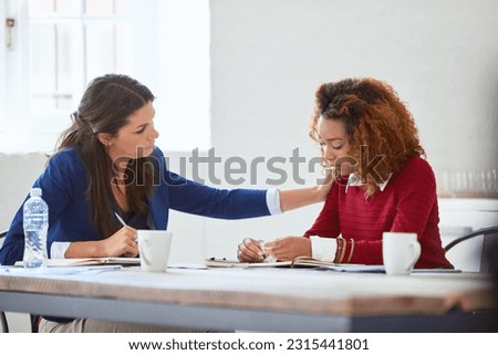 Business people, staff and women with comfort, empathy and care with professional, career and meeting. Coworkers, friends and manager with an employee, sympathy and grief with loss, sad and emotional Royalty-Free Stock Photo #2315441801