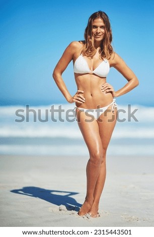 Body, portrait of woman in a bikini and at the beach with blue sky in Brazil. Freedom or adventure, summer vacation or holiday break and female person pose for swimwear or health wellness at the sea