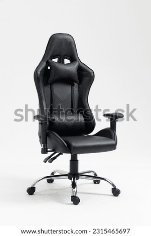 gaming Chair black color on white background, Workplace Professional gamers cafe room with powerful personal computer game chair black color. Adjustable black computer gaming chair. comfortable gaming