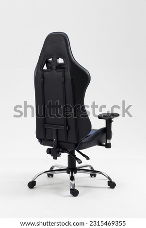 gaming Chair blue color on white background, Workplace Professional gamers cafe room with powerful personal computer game chair blue color. Adjustable blue computer gaming chair Royalty-Free Stock Photo #2315469355