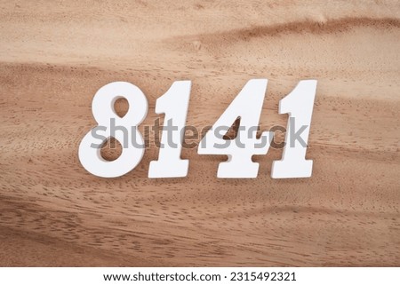 White number 8141 on a brown and light brown wooden background.