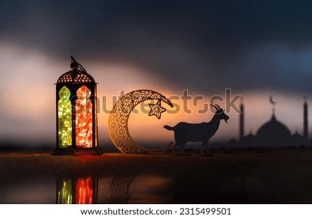 2024 Ramadan Mubarak and Eid Mubarak background, Traditional Ramadan lantern lamp with crescent moon and goat, New  Eid Al Adha image Royalty-Free Stock Photo #2315499501