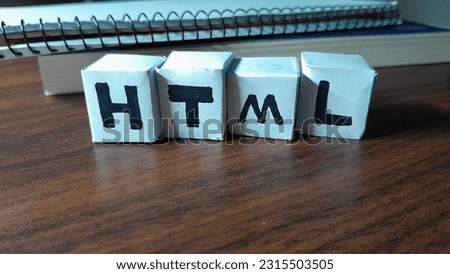 HTML programming alphabet cube.  Black and white color with wooden planks.