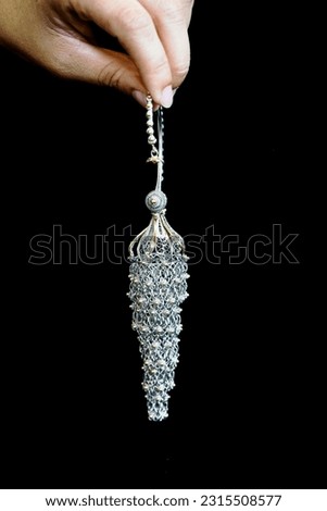  Handcraft silver earring in Thai style with black background