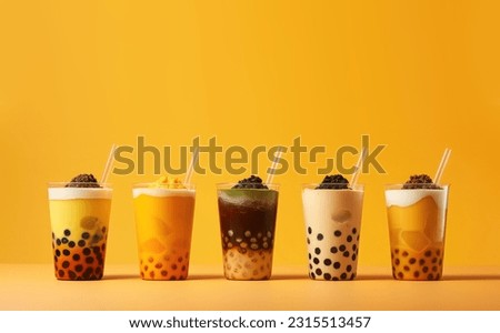Bubble Tea. Glass of bubble tea. Yellow bubble tea. Taiwan milk tea with bubbles. Royalty-Free Stock Photo #2315513457