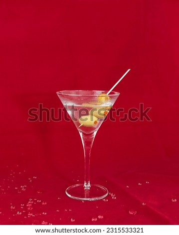 martini rosso bianco d'ore rosato extra dry diero varieties spices fruits party invitation organization bar night club pre-dinner snack elegance yellow red green blue alcohol glass drink coctail cold  Royalty-Free Stock Photo #2315533321